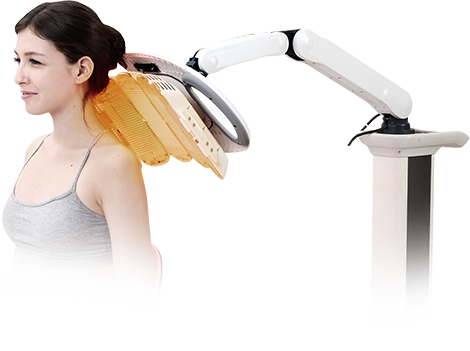 Healite II used on a woman's neck and back Healite II used on a woman's neck and back